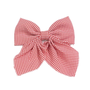 Elegant red and white gingham bow hair clip for women with classic checkered pattern