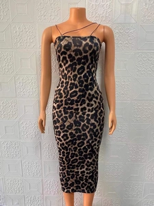 Detail of slim fit leopard print midi dress showing fabric texture and thin straps