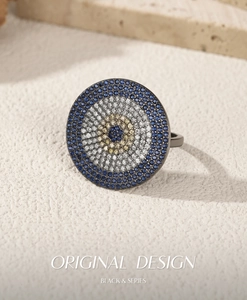 Macro detail of S925 silver Evil Eye ring with black finish and micro-pave blue cubic zirconia