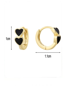 Close-up of S925 silver 14K gold earrings with black heart enamel and size markers