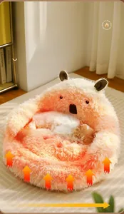 Detail of plush alpaca cat bed showing cozy lion velvet texture and sleeping cat