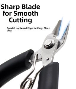 Close-up of hardened precision cutting edge and spring design on mini DIY pliers