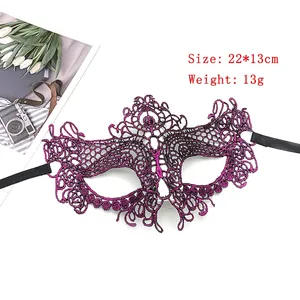 Detail view of purple gold-stamped lace masquerade mask with dimensions 22x13cm