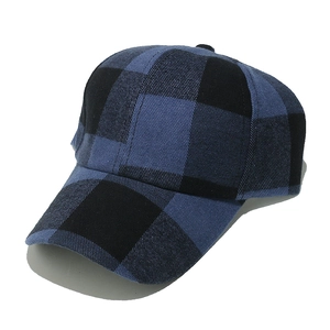 Close-up of blue and black buffalo check pattern on a classic cotton baseball cap