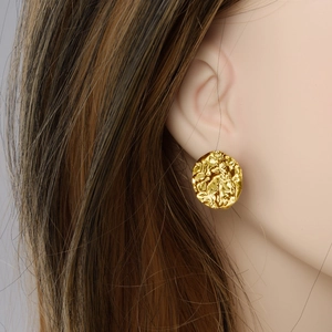 Elegant 304 stainless steel golden wrinkled stud earring worn by a model in close-up
