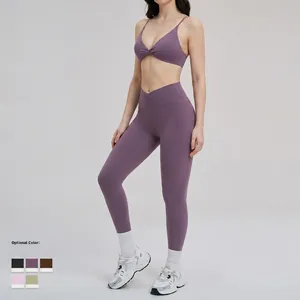 Ensemble de yoga violet avec taille croisée, brassière torsadée et legging en 5 coloris