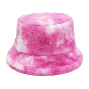 Close-up of soft pink and white tie-dye faux fur bucket hat with plush texture detail