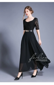 Detail of elegant black lace bodice and chiffon midi dress with stylish leather waist belt