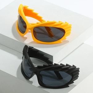 Futuristic lightning frame sunglasses in yellow and black on minimalist white display