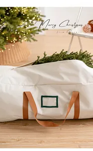 Macro detail of Christmas tree storage bag with reinforced handles and clear label window