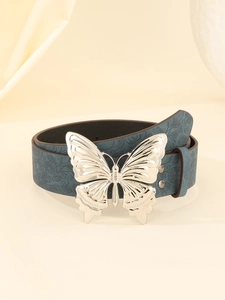 Detail view of American vintage Y2K leather belt with silver butterfly buckle