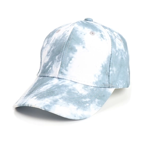 Close-up of blue and white tie-dye patterns on a structured six-panel baseball cap