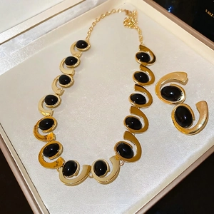 Vintage gold and black gemstone geometric oval jewelry set with necklace and earrings