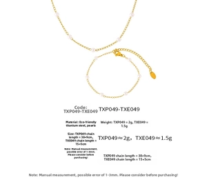 Detailed view of titanium steel gold necklace and bracelet set with elegant shell pearls