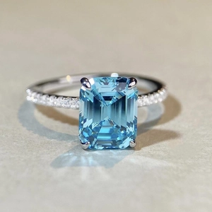 925 silver aquamarine ring with emerald cut blue gemstone and pavé diamonds