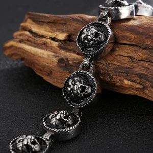 Close-up of hip-hop tiger head relief on vintage steel bracelet with aged finish
