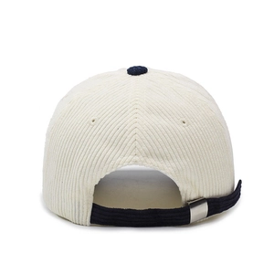 White corduroy baseball cap with navy blue embroidery and adjustable metal buckle back