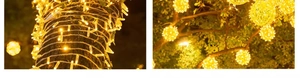 Dettaglio delle luci fatate a LED giallo caldo e decorazioni a sfera in rattan