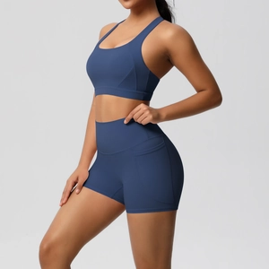 Detail showing side pocket and high waist design on blue yoga shorts set