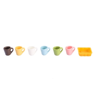 Miniature resin dollhouse set with six colorful mugs and a yellow scalloped tray