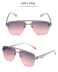 Detail of rimless gradient grey pink sunglasses with double bridge and embossed temples