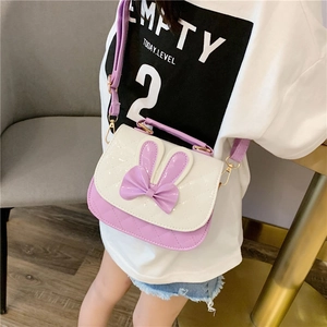 Cute girls purple and white quilted crossbody bag with rabbit ears and bow detail