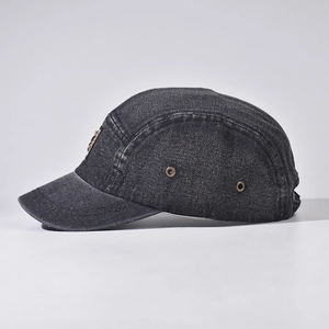 Short brim washed denim baseball cap in dark grey with five-panel design and side logo
