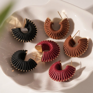 Retro C-shape earrings in brown, black, and burgundy leather wrap on shell plate