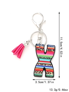 Detail view of rainbow leopard letter X keychain with pink tassel and measurement labels