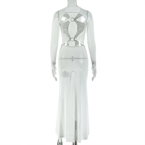 Back view of white mesh dress featuring a deep open back with metal ring details