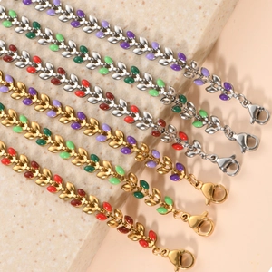 Detail of 18K gold and silver plated olive leaf bracelets with colorful oil drop inlay