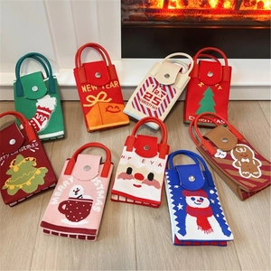 Collection of Christmas cartoon knitted mini handbags featuring festive Santa and snowmen