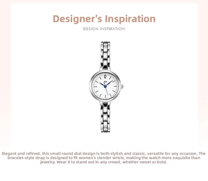 Close-up of minimalist women's silver chain watch with a white dial and blue hands