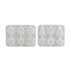 Set of two silicone resin molds featuring snowflake and Christmas tree cutout patterns