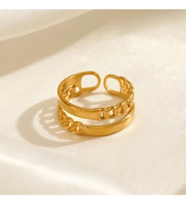 Close-up of a double-layered 18K gold-plated chain ring on a warm satin background