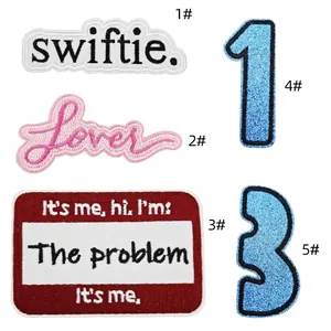 Detailed view of Taylor Swift inspired Swiftie and Lover embroidered patch set