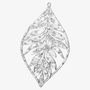 Detailed shot of silver cutout leaf pendant with hammer textured stainless steel finish