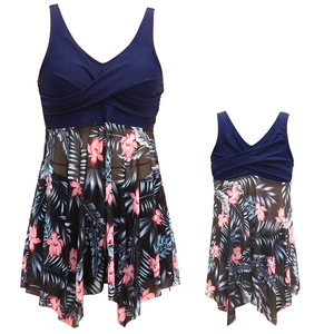 Family matching dark blue floral swimsuit set with V-neck cross straps and palm leaf print