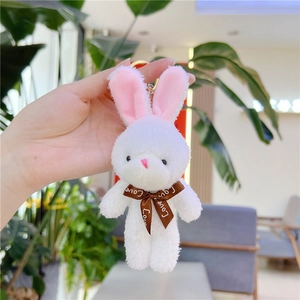 Porte-clés lapin en peluche blanche avec oreilles roses et nœud papillon marron Love