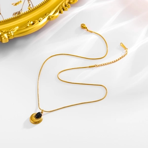 Elegant gold-plated stainless steel snake chain necklace with black stone shell pendant