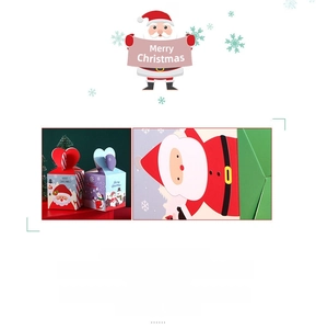 Detail of Christmas gift boxes with Santa designs and heart-shaped folding top closure