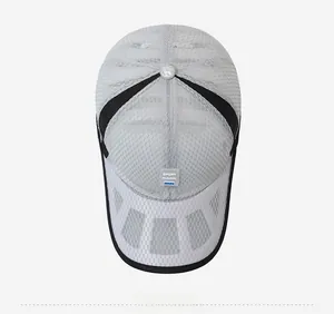 Top view of light grey mesh baseball cap showing breathable sport fabric texture