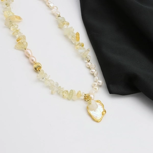 Baroque pearl and citrine long necklace with mother of pearl pendant on black silk