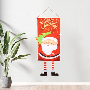 Hanging Christmas banner featuring Santa and tree on a white wall with red cord