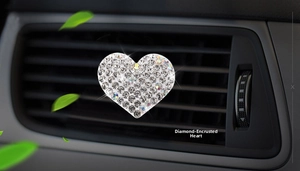 Sparkling diamond-encrusted heart-shaped car air vent clip with glittery rhinestones