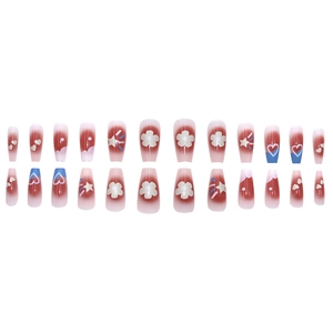 Medium coffin press-on nails featuring red gradient with flower heart and star patterns