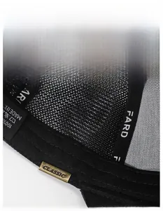 Close-up of moisture-wicking sweatband and metal adjustment buckle on the baseball cap