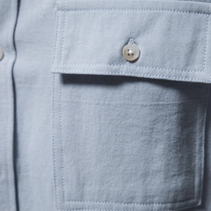 Men's light blue pure cotton long sleeve casual shirt with buttoned chest pocket