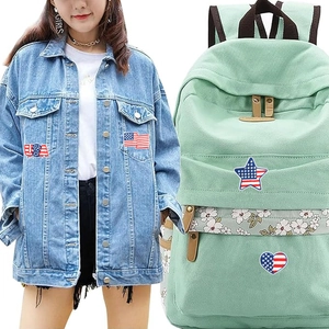 USA flag themed embroidery patches featuring stars and hearts on jacket and canvas bag