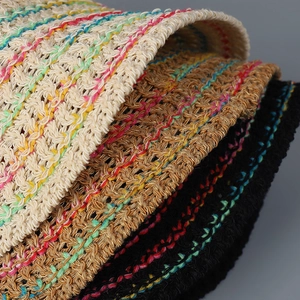 Breathable rainbow knit bucket hat for beach vacations in cream, brown and black